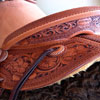 Cow Boss Gullet - 7 -1/2H by 6 - 1/4W by 4, Horn - 3 by 3 inch Round Horn, 94 degree Quarter Horse bars,7/8ths full in skirt riggin, 16 - 1/4 inch seat Cheyenne Roll - 1 - 3/4 inch and decorated with Valleys' Sheridan floral tooling pattern dallied by Valleys' Vaquero Lace border.